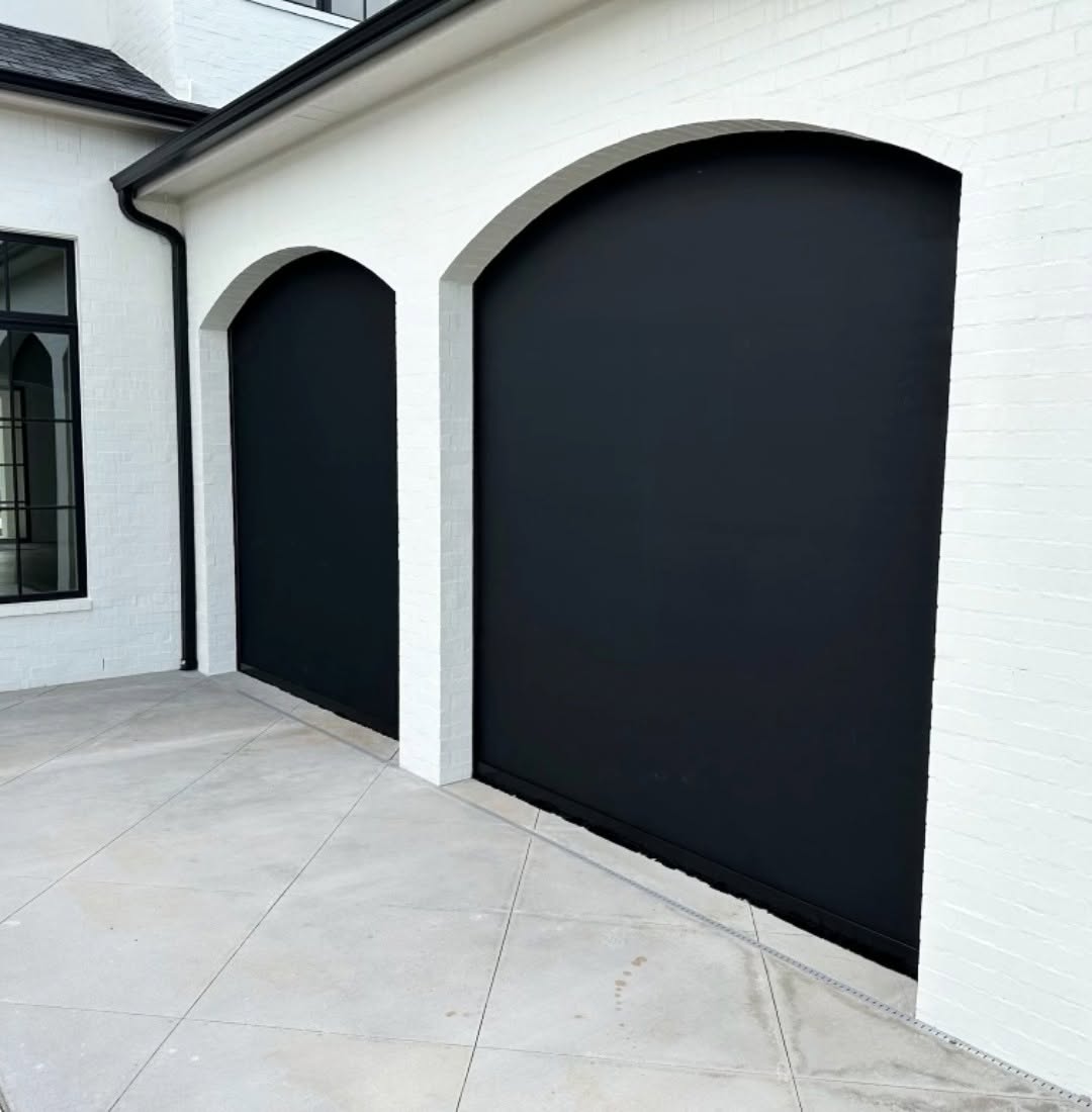Motorized exterior solar screens on a covered luxury Florida patio by Sarasota Window Blinds